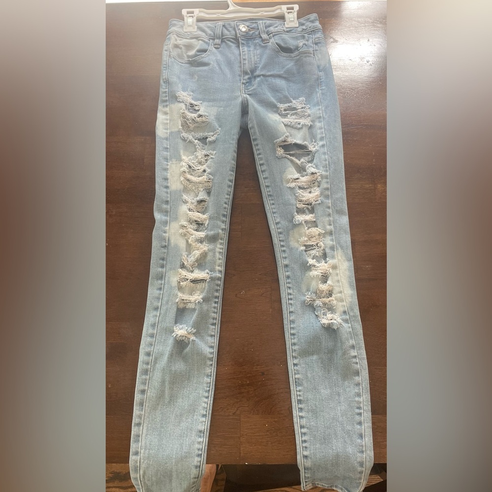 American eagle high rise jegging size 2.  Like new.  Ripped jeans light washed